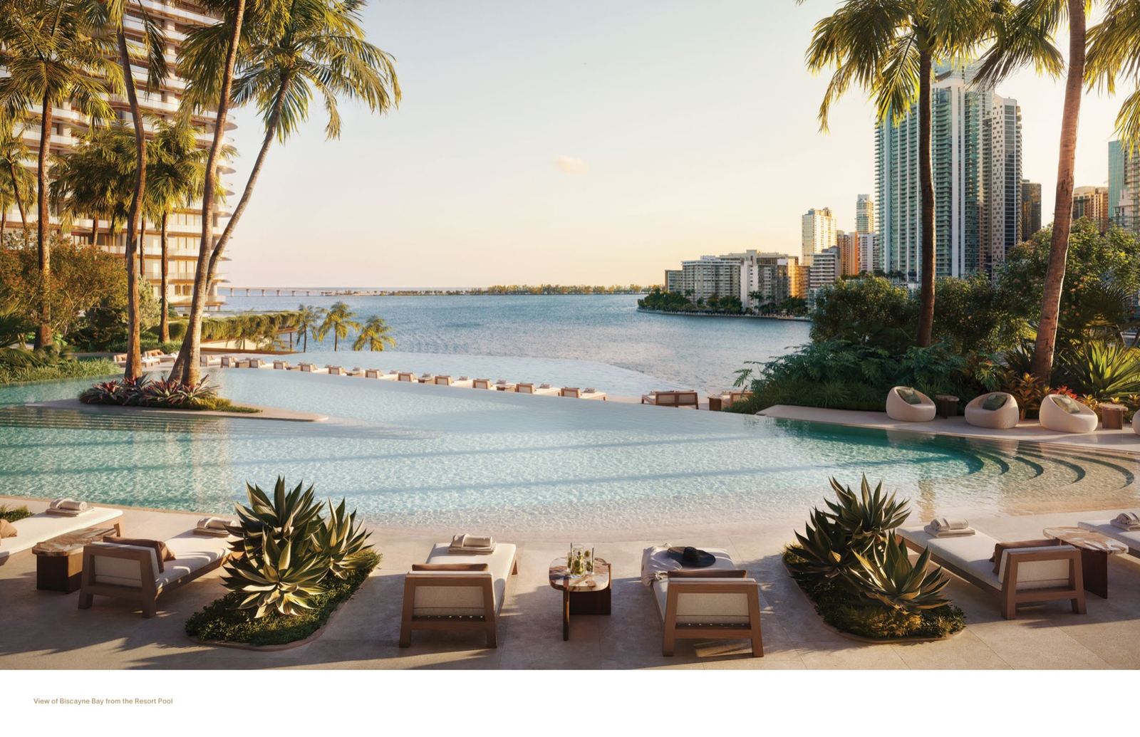 Ocean pool with cabanas and panoramic views of Fisher Island and Biscayne Bay at Mandarin Oriental Residences Miami